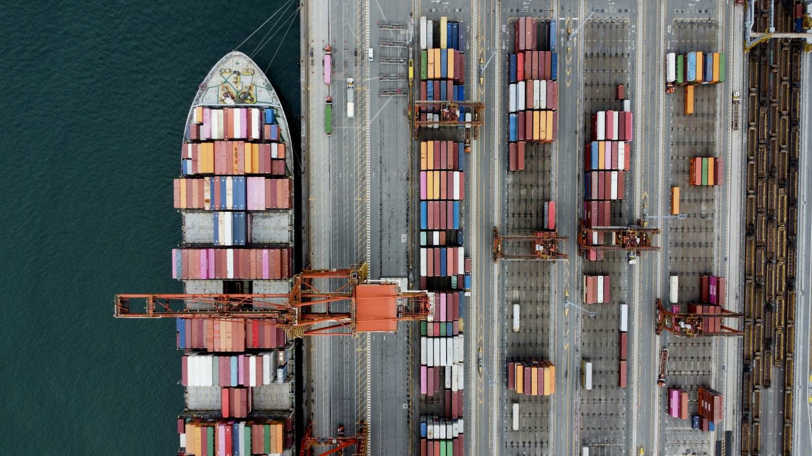 Container ship alongside a port terminal